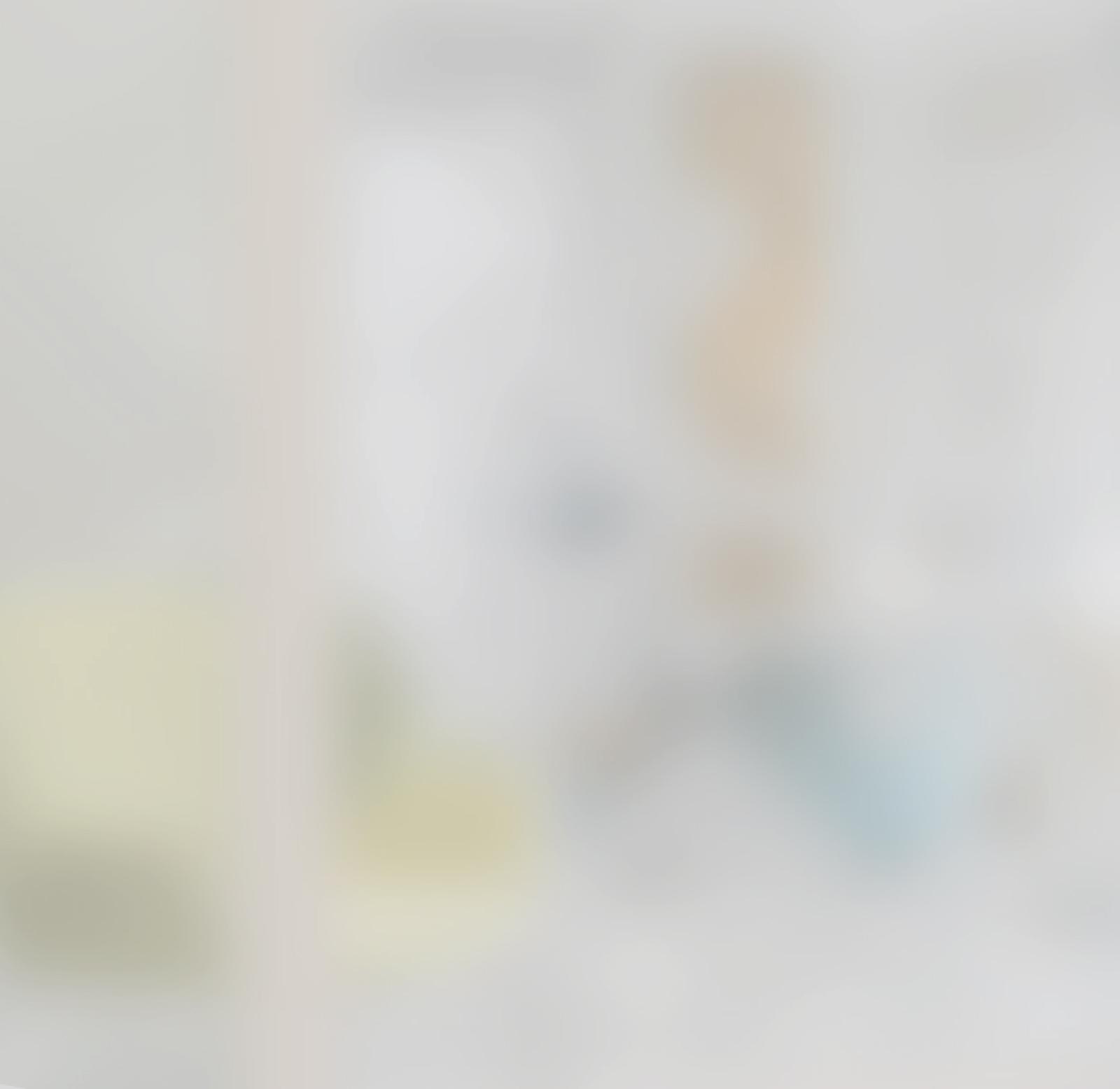 A blurred image of a waiting room