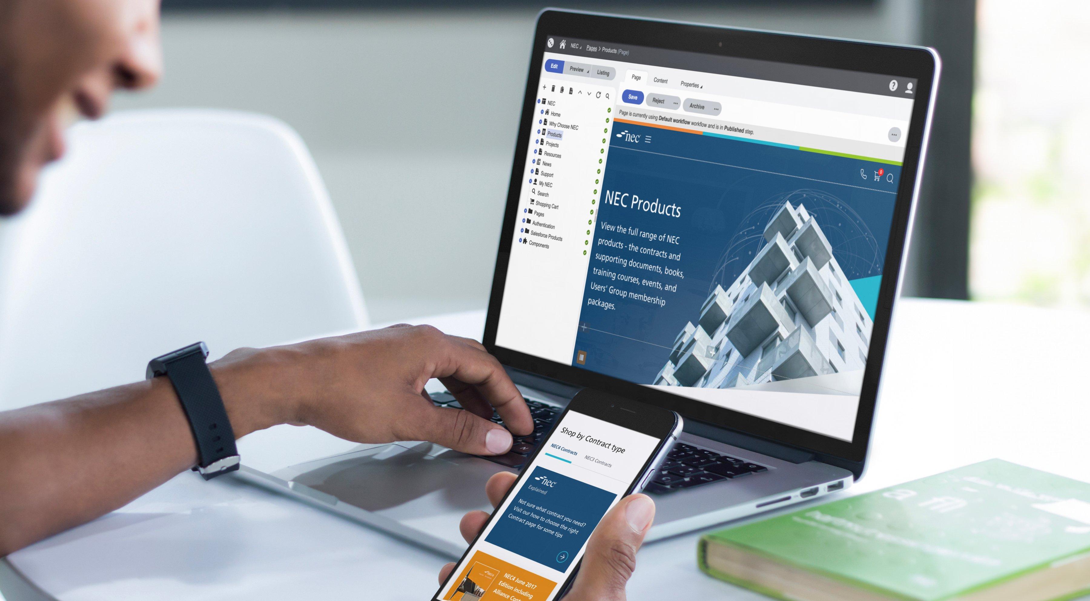 A man using Kentico CMS on his laptop