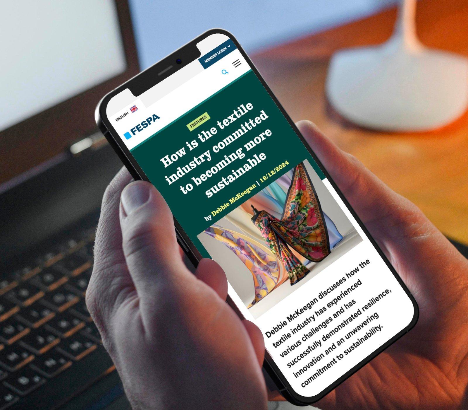 Screen of mobile showing a colour themed news page. It's green to show sustainability