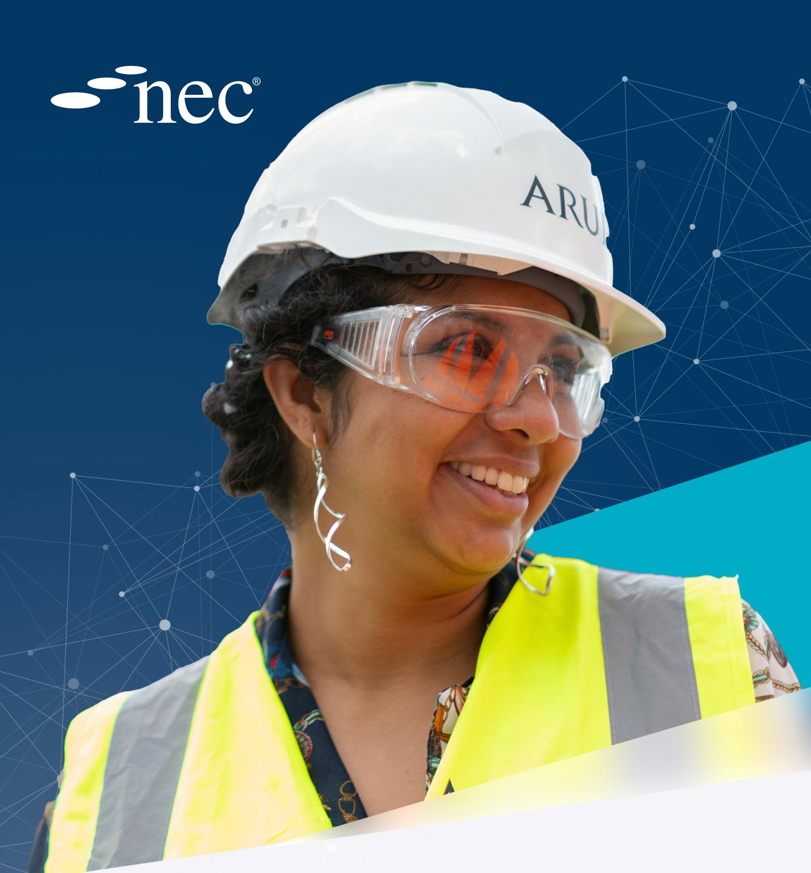 A close up of a woman in a hard hat smiling