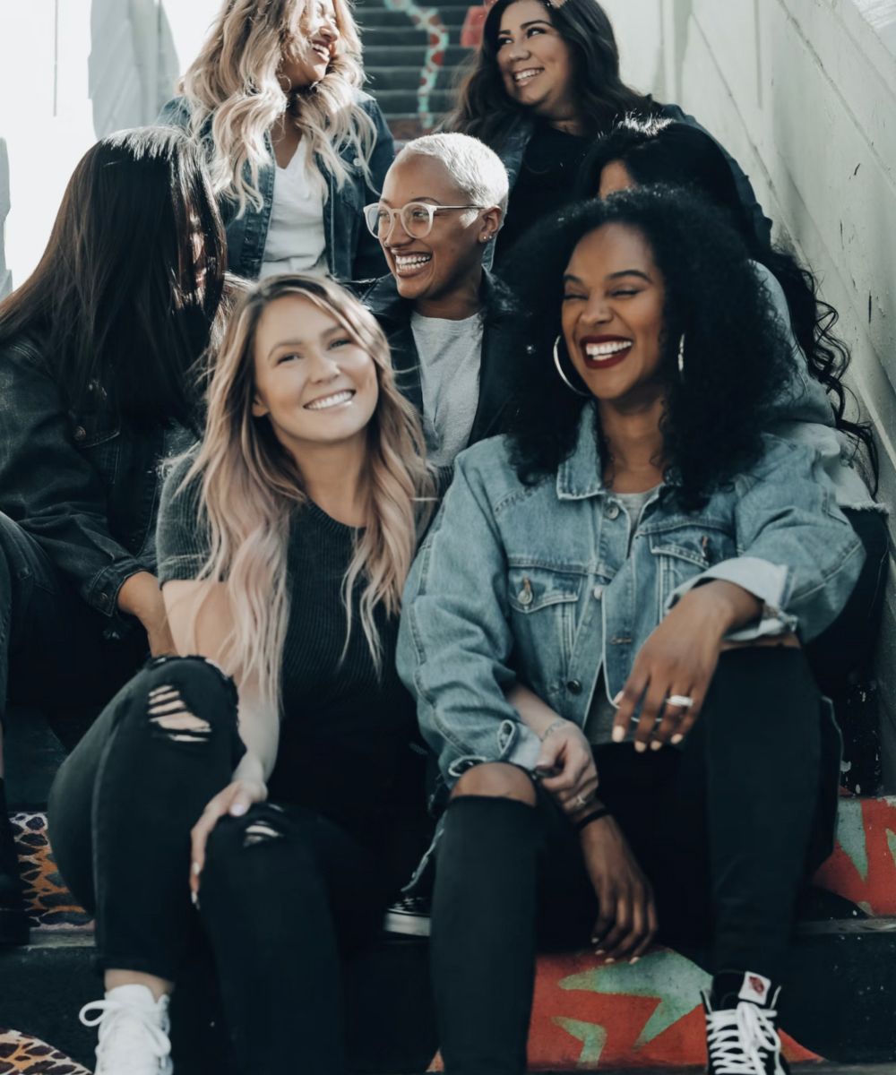 A shot of some women sitting on stairs